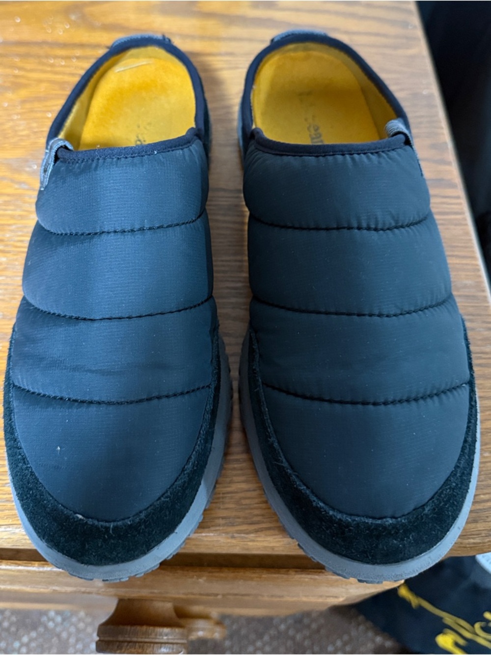 L.L. Bean Women’s Black Quilted Slip-On Slippers with Yellow Interior